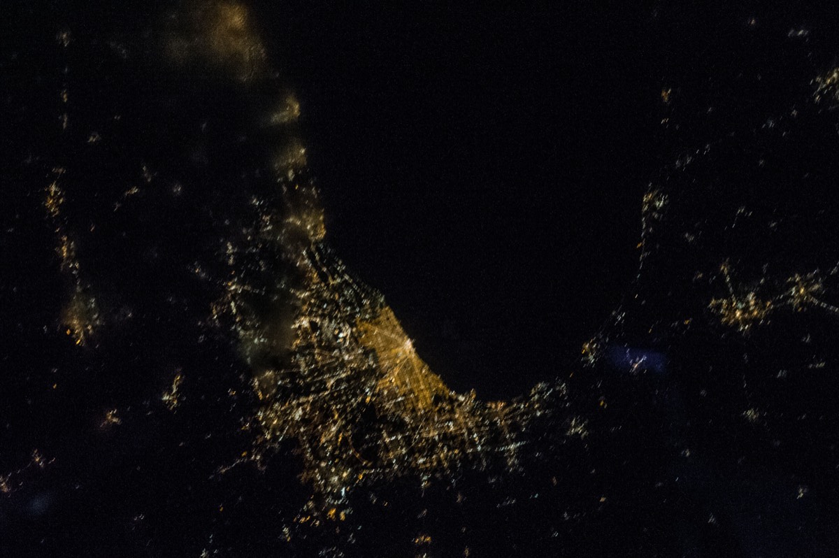 The Lake Michigan shoreline glowing at night, seen from the International Space Station